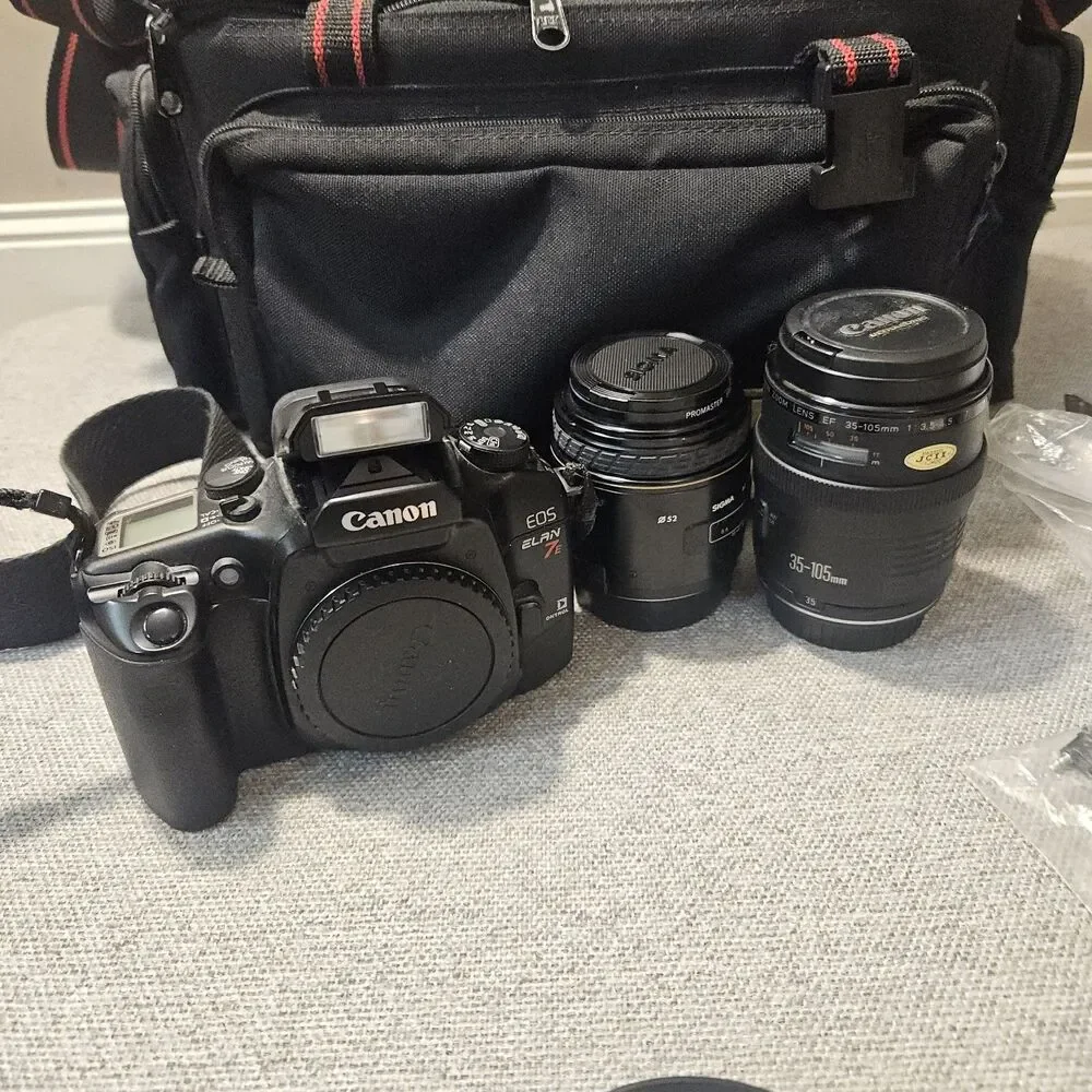 Canon EOS Elan 7E 35mm Film Camera Bundle w/  2 Lenses  Bag Flash Filters More